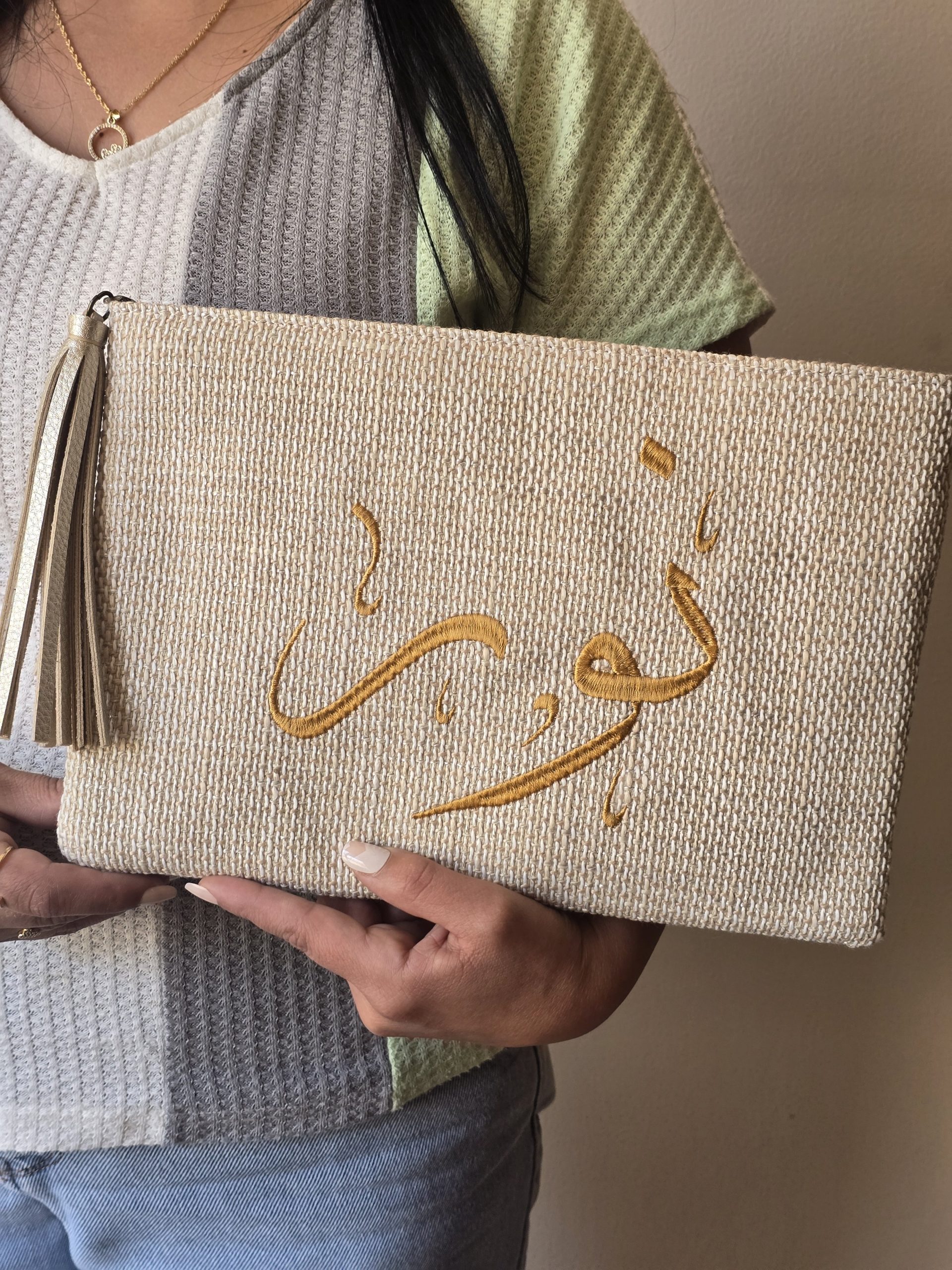 A. Customized Clutch: Arabic Calligraphy- Golden
